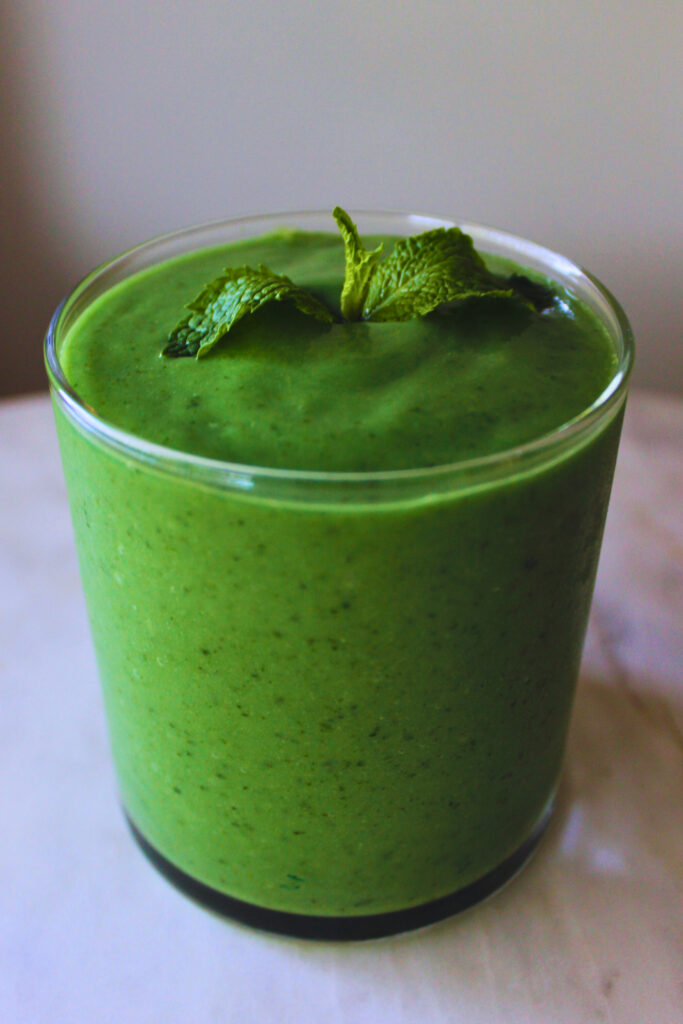 image of creamy green smoothie in a glass