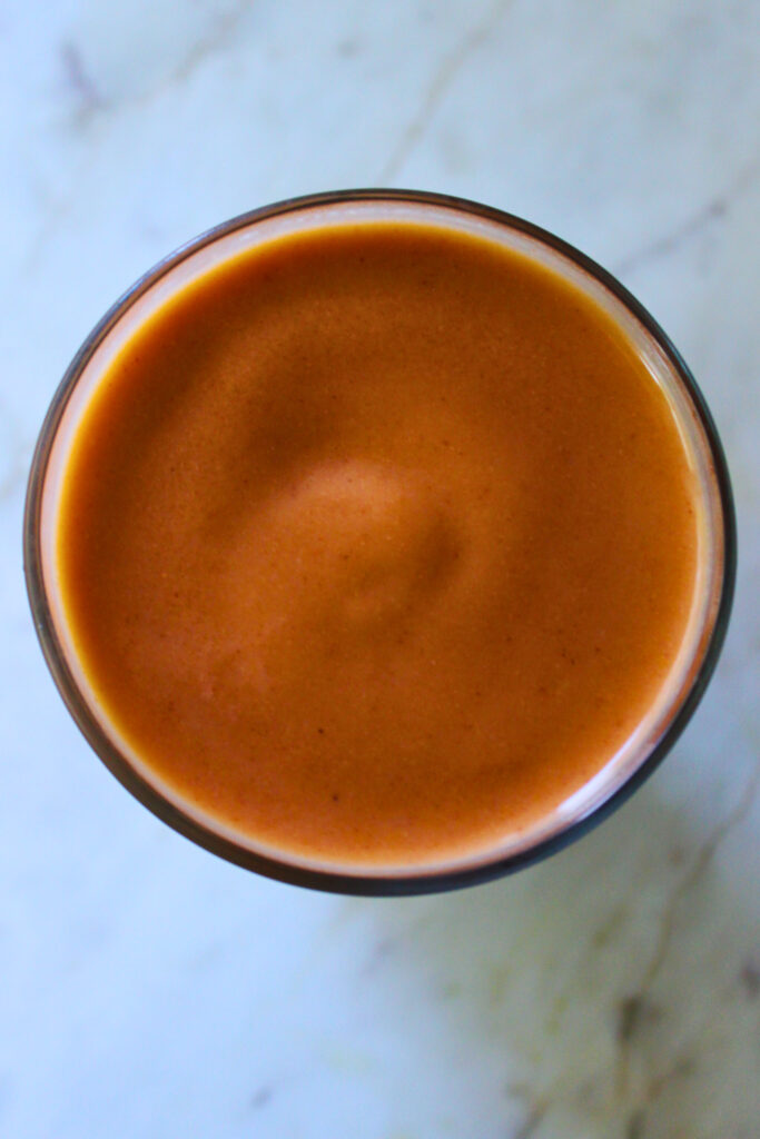 overhead image of mamey shake in a glass