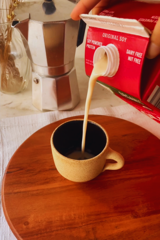 image of soy milk being poured onto a cup
