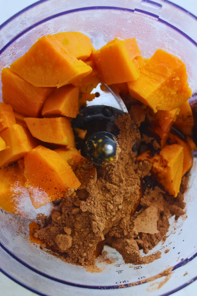 sweet potato chocolate pudding ingredients inside a food processor