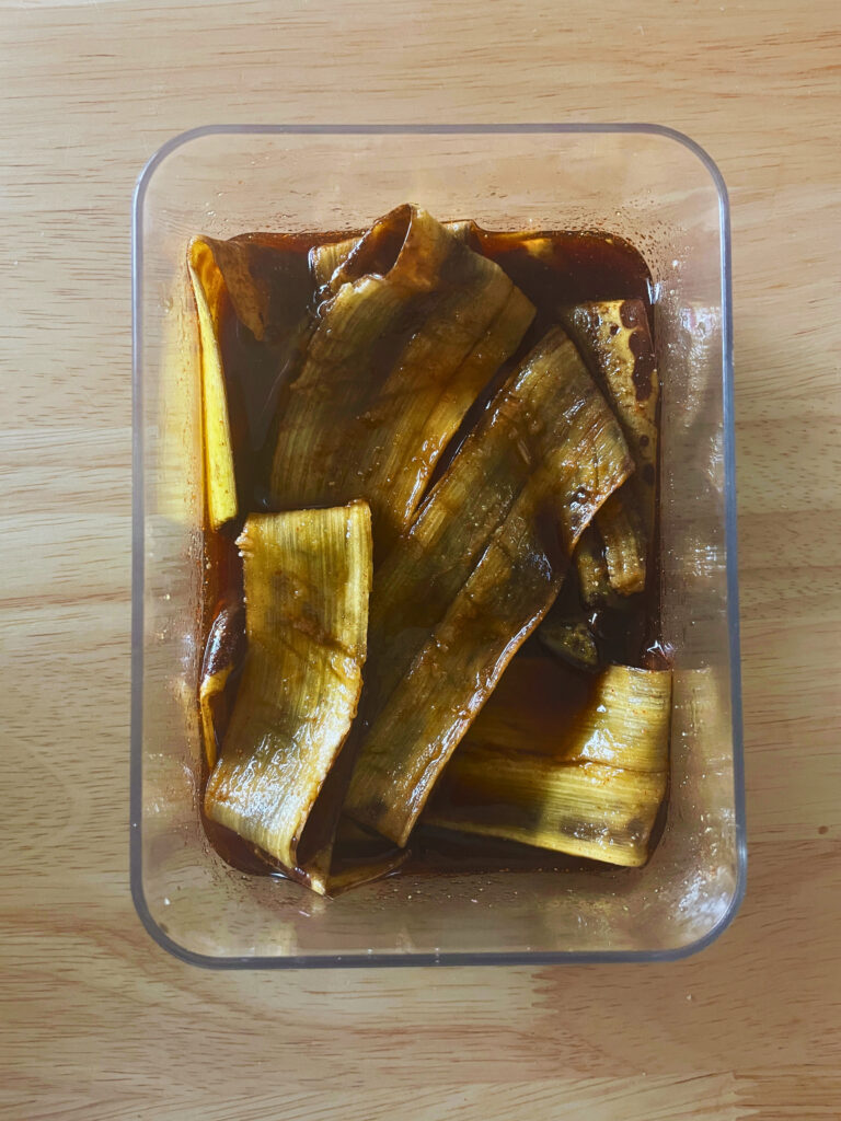 Image of banana peels marinating for banana peel bacon recipe
