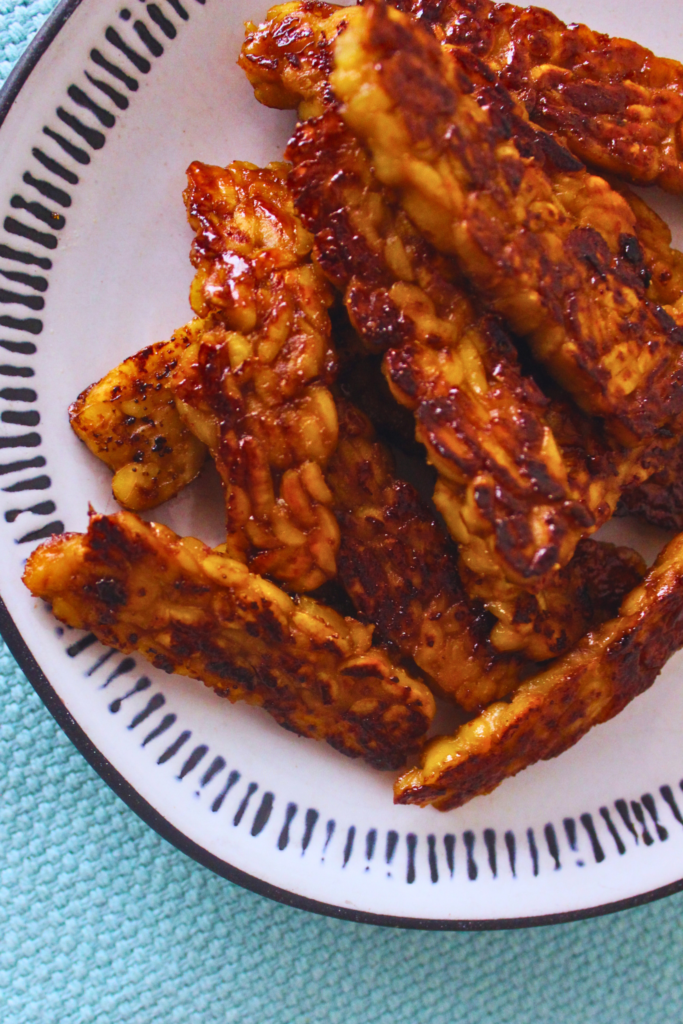 image of smokey tempeh bacon on a plate