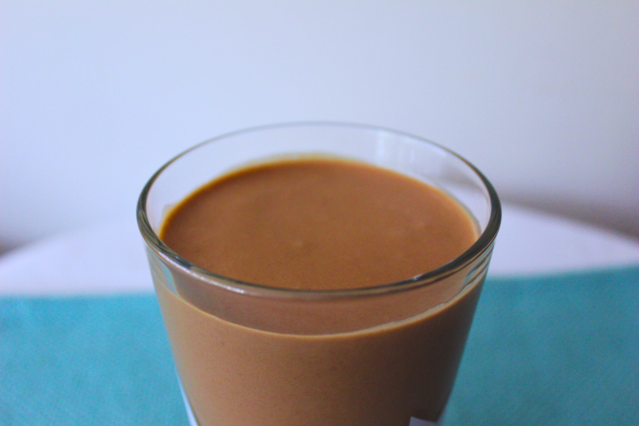 Image: Glass filled with Chocolate Peanut Butter Banana Smoothie