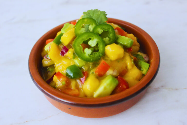 Image of Mango Salsa garnished with jalapeño slices