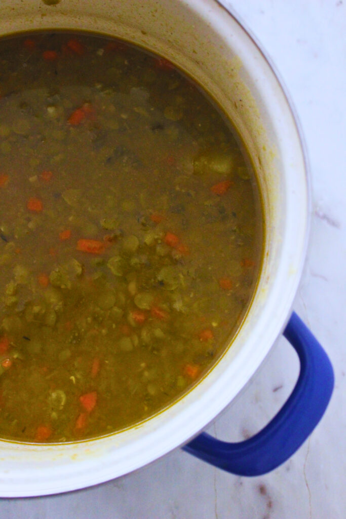 overhead image of split pea soup in pot