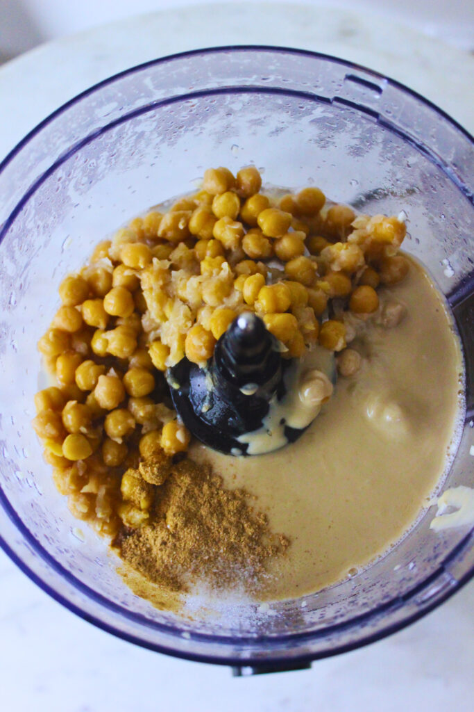 Overhead image of hummus ingredients in a food processer