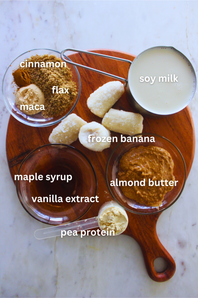 overhead image of ingredients to make a maca snickerdoole smoothie