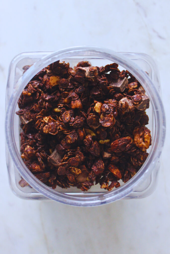 overhead image of homemade granola in a container