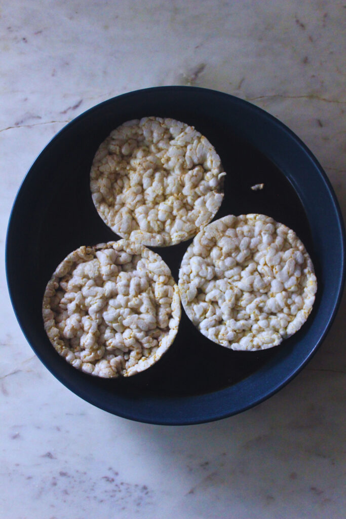 three rice cakes soaking espresso coffee