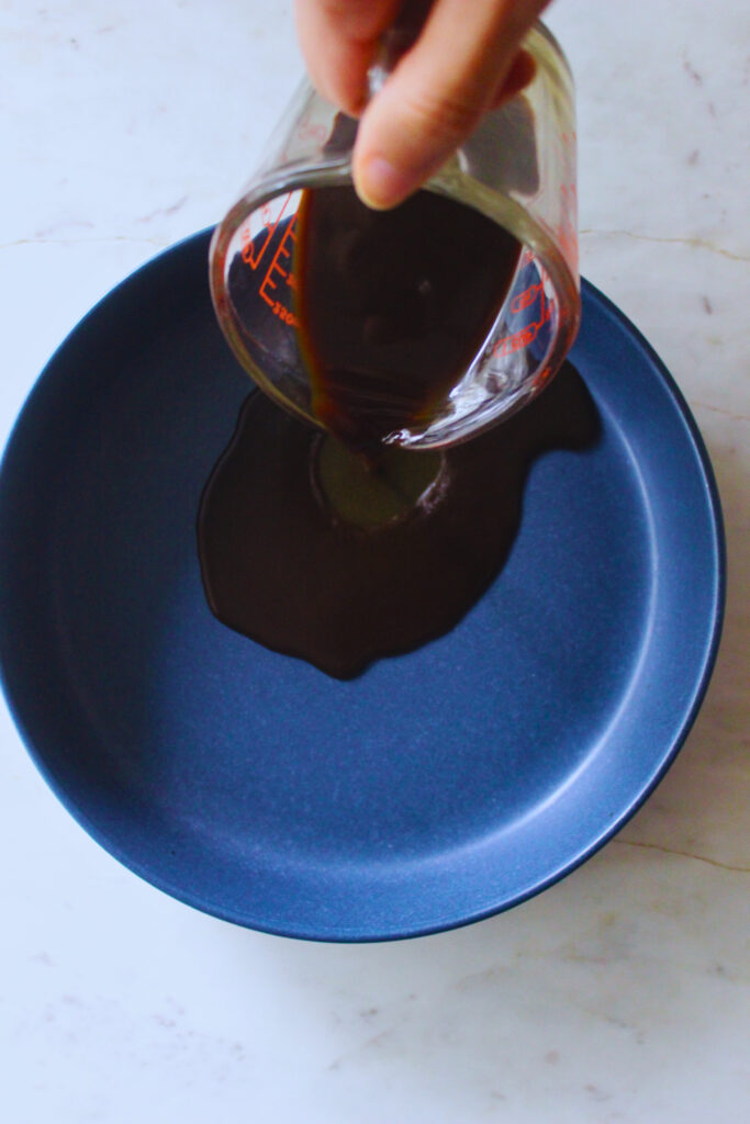 pouring coffee into a plate