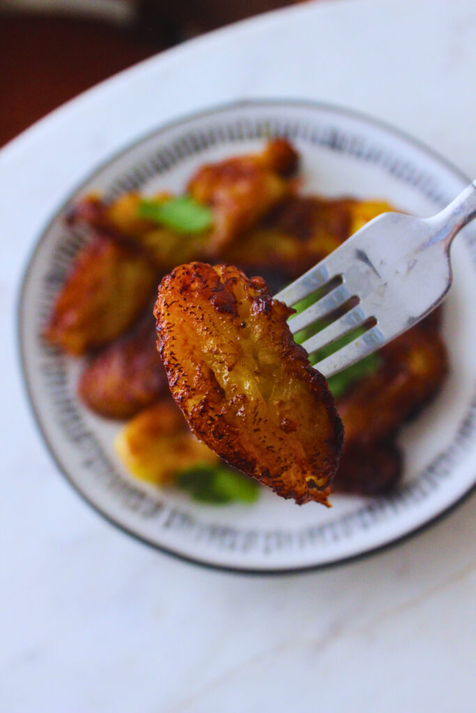 image of a fork holding a cooked fried sweet plantain