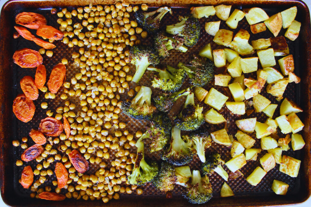 overhead image of roasted veggies on sheet pan