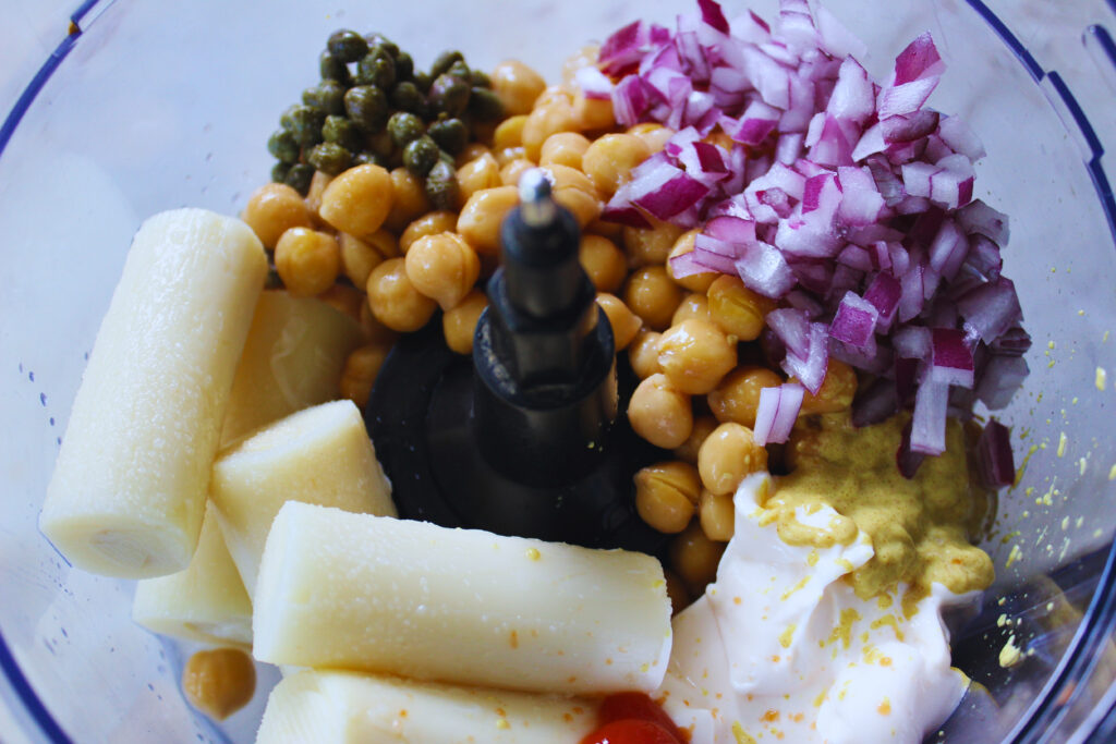ingredients to make creamy chickpea "tuna" in a food processor